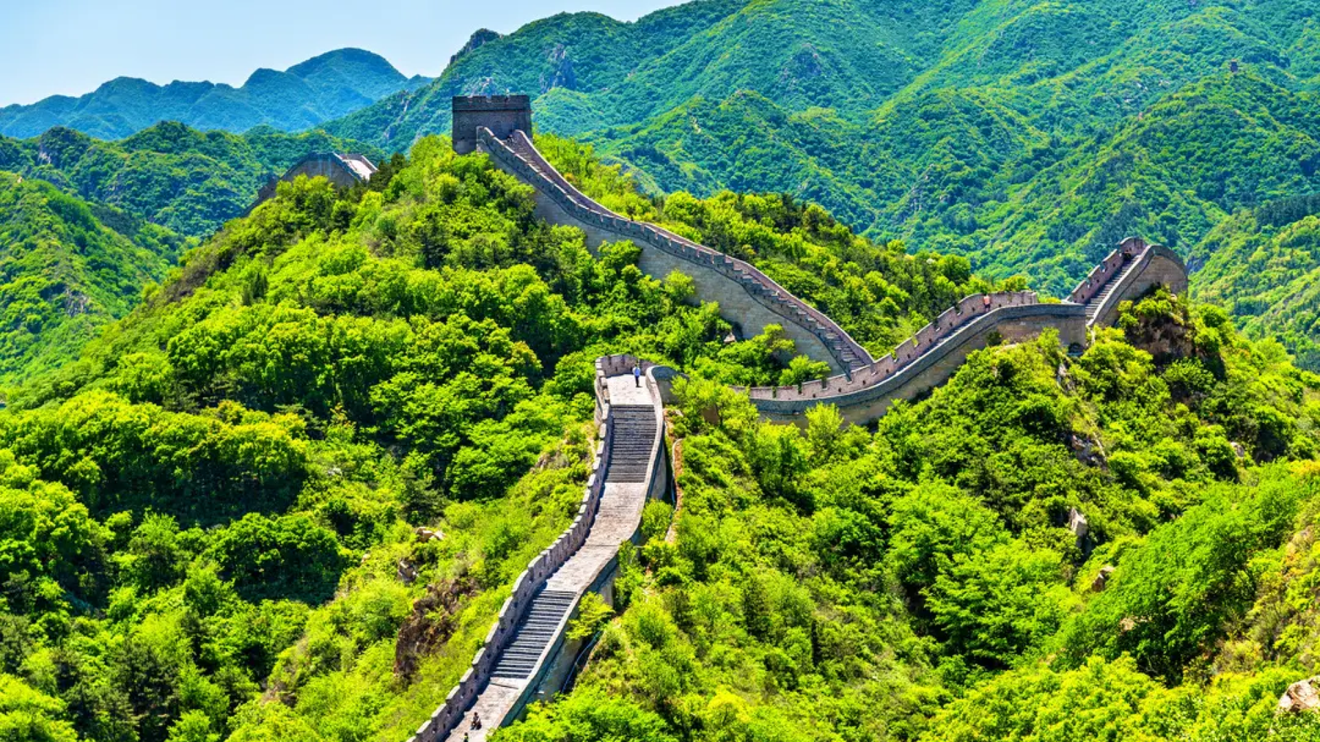 Badaling Great Wall and green mountain ridges in summer